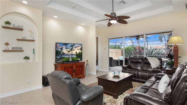 20029 Saraceno Dr, Estero, FL 33928 - living room with a tray ceiling, ceiling fan, light tile patterned flooring, and recessed lighting
