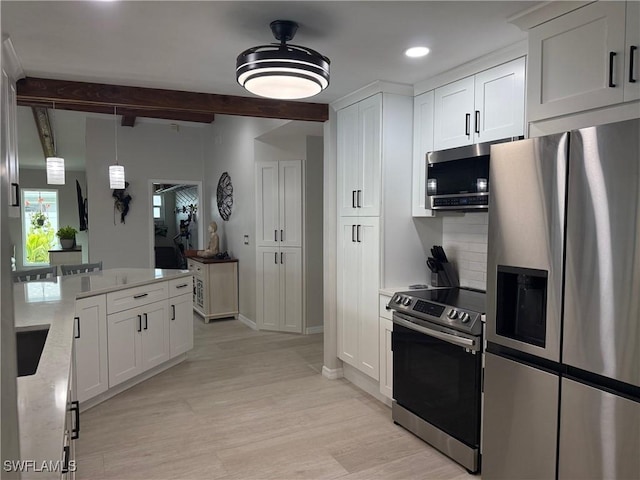 804 SW Santa Barbara Pl, Cape Coral, FL 33991 - kitchen featuring appliances with stainless steel finishes, recessed lighting, beam ceiling, light wood-style floors, and tasteful backsplash