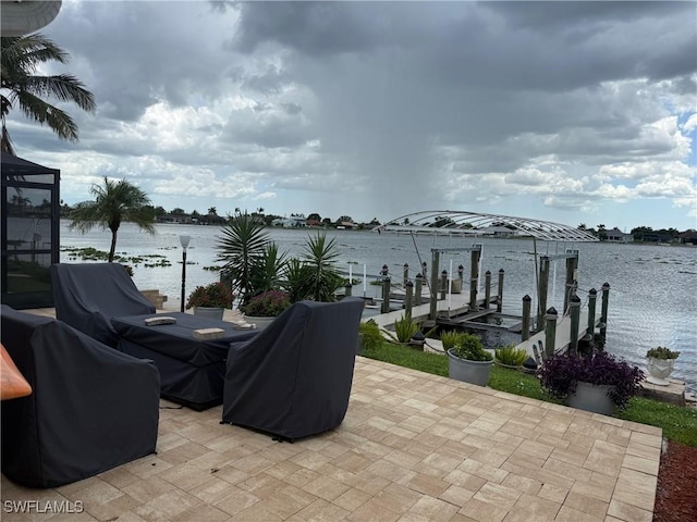 804 SW Santa Barbara Pl, Cape Coral, FL 33991 - view of patio / terrace featuring a boat dock and a water view