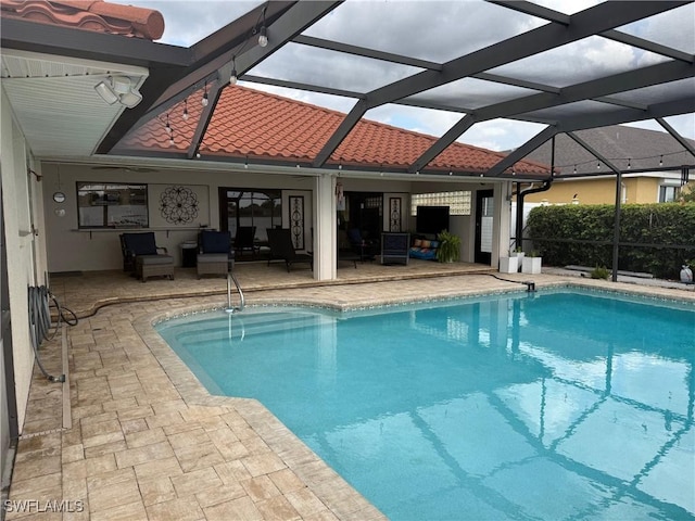 804 SW Santa Barbara Pl, Cape Coral, FL 33991 - swimming pool with a patio area, an outdoor living space, and a lanai