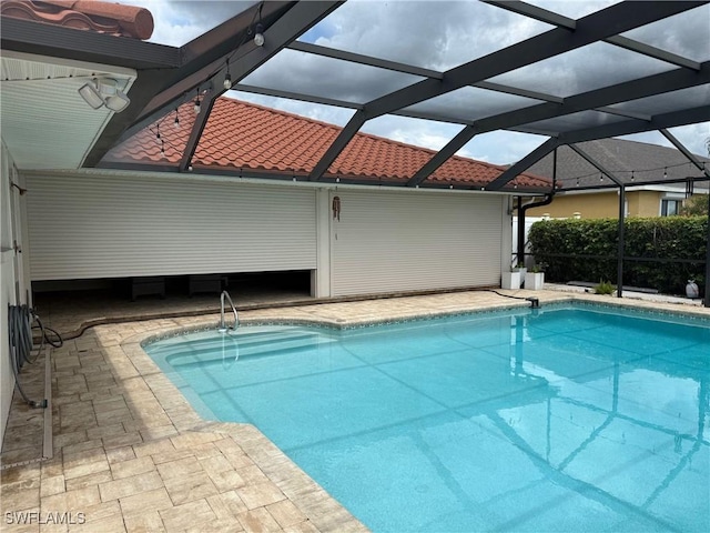 804 SW Santa Barbara Pl, Cape Coral, FL 33991 - swimming pool featuring glass enclosure and a patio area