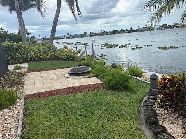 804 SW Santa Barbara Pl, Cape Coral, FL 33991 - view of yard featuring a patio and a water view