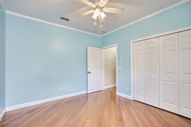 15050 Lakeside View Dr Unit 1003, Fort Myers, FL 33919 - unfurnished bedroom featuring ornamental molding, light wood-type flooring, a closet, and ceiling fan