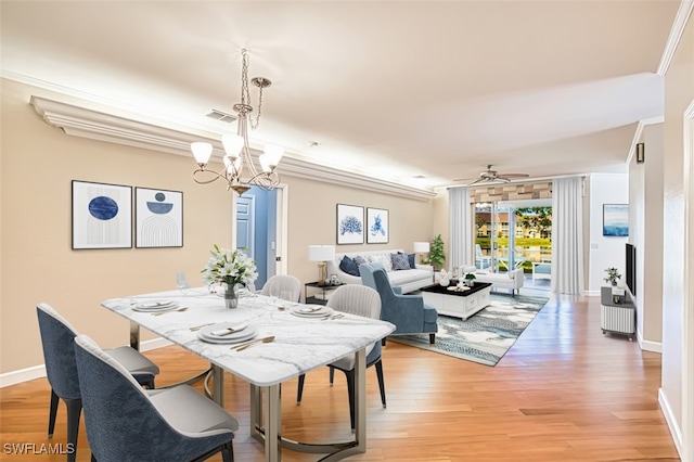 15050 Lakeside View Dr Unit 1003, Fort Myers, FL 33919 - dining room featuring a chandelier, light wood finished floors, and ceiling fan