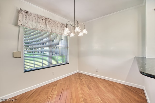 15050 Lakeside View Dr Unit 1003, Fort Myers, FL 33919 - unfurnished dining area featuring crown molding, wood finished floors, and a chandelier
