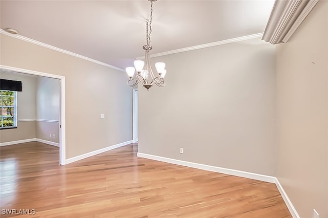15050 Lakeside View Dr Unit 1003, Fort Myers, FL 33919 - empty room featuring crown molding, a chandelier, and light wood finished floors