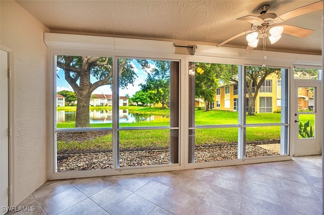 15050 Lakeside View Dr Unit 1003, Fort Myers, FL 33919 - unfurnished sunroom with a water view and ceiling fan