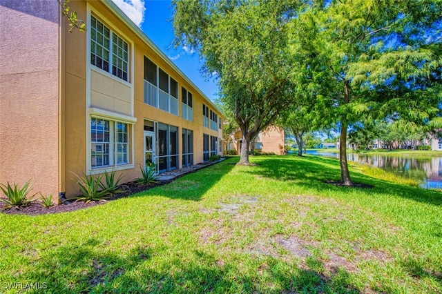 15050 Lakeside View Dr Unit 1003, Fort Myers, FL 33919 - view of green lawn featuring a water view