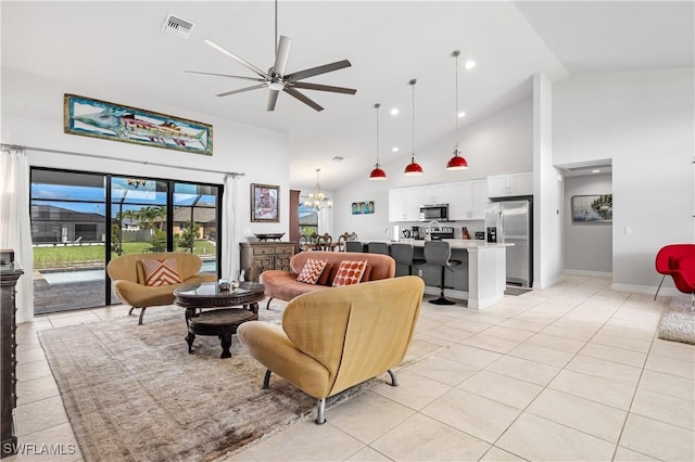 2502 SW 17th Ave, Cape Coral, FL 33914 - living area with high vaulted ceiling, light tile patterned floors, ceiling fan, a chandelier, and recessed lighting