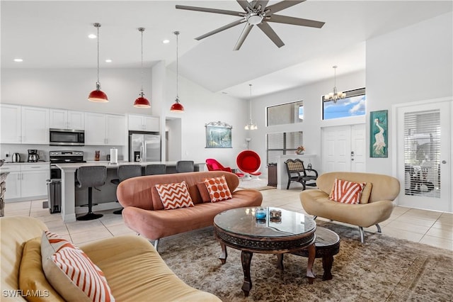 2502 SW 17th Ave, Cape Coral, FL 33914 - living room featuring high vaulted ceiling, light tile patterned flooring, a chandelier, ceiling fan, and recessed lighting