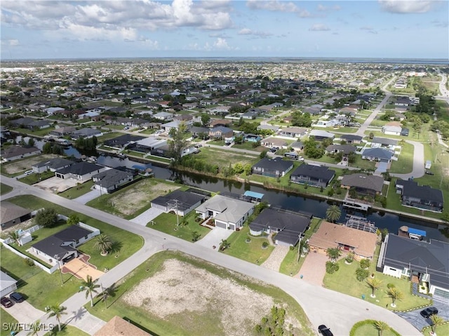2502 SW 17th Ave, Cape Coral, FL 33914 - aerial view of property and surrounding area featuring nearby suburban area and a nearby body of water