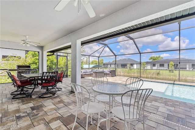 2502 SW 17th Ave, Cape Coral, FL 33914 - view of patio featuring a ceiling fan, outdoor dining area, an outdoor pool, and glass enclosure