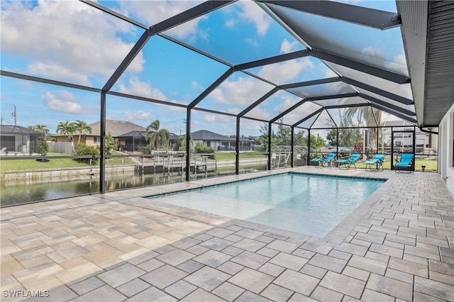 2502 SW 17th Ave, Cape Coral, FL 33914 - swimming pool with a patio, a water view, a residential view, and a lanai