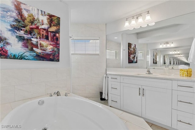 2502 SW 17th Ave, Cape Coral, FL 33914 - bathroom featuring a bath, vanity, and a tile shower