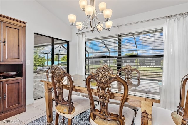 2502 SW 17th Ave, Cape Coral, FL 33914 - dining space featuring light tile patterned floors and a chandelier