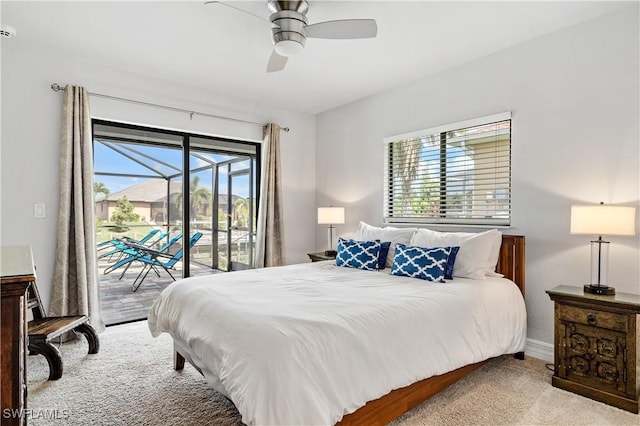 2502 SW 17th Ave, Cape Coral, FL 33914 - bedroom with access to outside, multiple windows, carpet flooring, and ceiling fan