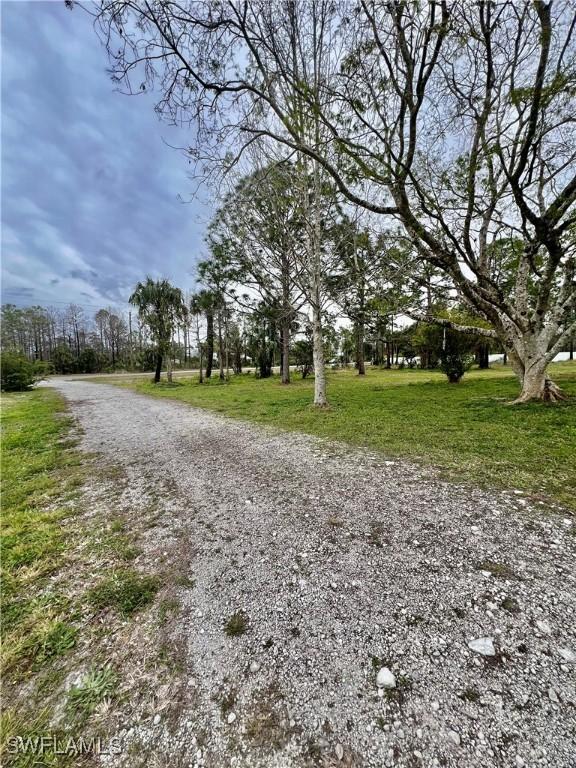 50 24th Ave NW, Naples, FL 34120 - view of dirt / gravel road