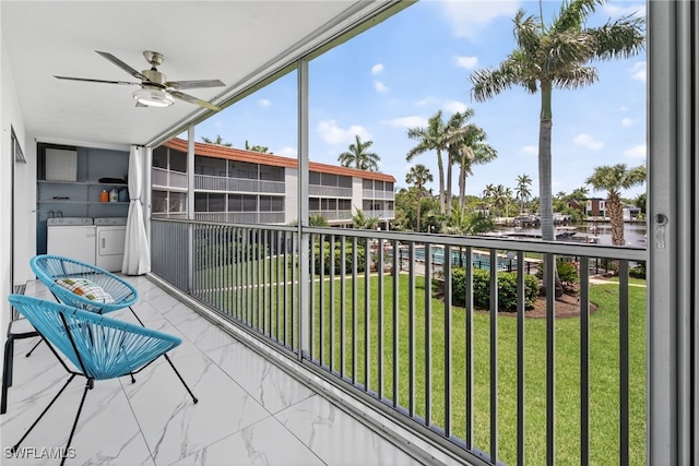 1666 Osprey Ave Unit 106, Naples, FL 34102 - balcony featuring washer and dryer and a ceiling fan