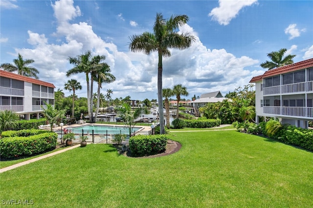 1666 Osprey Ave Unit 106, Naples, FL 34102 - view of grassy yard