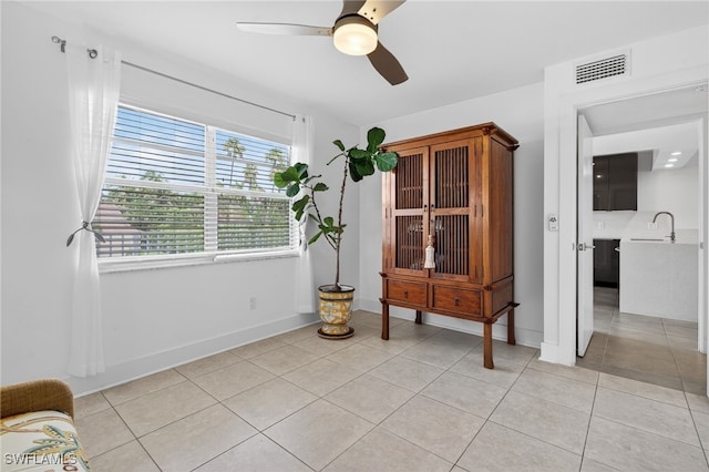 1666 Osprey Ave Unit 106, Naples, FL 34102 - dining room with light tile patterned floors and ceiling fan