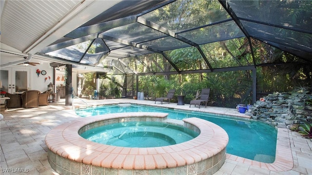 5961 Sea Grass Ln, Naples, FL 34116 - view of pool with a patio area, a pool with connected hot tub, and glass enclosure