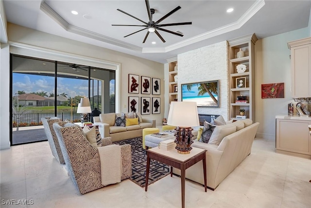 9691 Monteverdi Way, Fort Myers, FL 33912 - living area with ceiling fan, a raised ceiling, built in shelves, recessed lighting, and ornamental molding