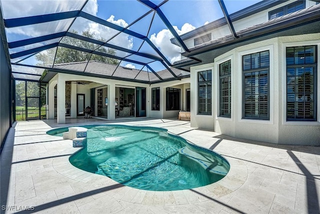 9691 Monteverdi Way, Fort Myers, FL 33912 - swimming pool with a patio area, a ceiling fan, and a lanai
