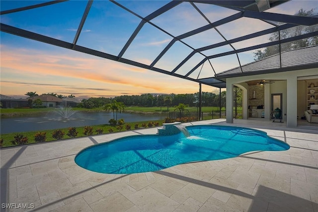 9691 Monteverdi Way, Fort Myers, FL 33912 - swimming pool featuring a patio, a water view, a ceiling fan, and a lanai