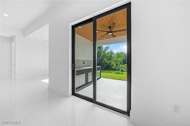 807 Hamilton Ave, Lehigh Acres, FL 33972 - doorway to outside featuring tile patterned flooring