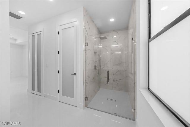 807 Hamilton Ave, Lehigh Acres, FL 33972 - bathroom with a marble finish shower, recessed lighting, and tile patterned floors