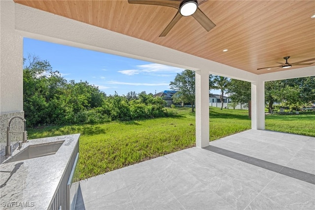 807 Hamilton Ave, Lehigh Acres, FL 33972 - view of patio / terrace with a ceiling fan and a sink
