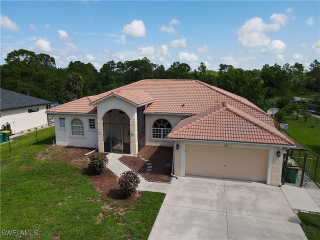 2041 24th Ave NE, Naples, FL 34120 - mediterranean / spanish home featuring driveway, a tile roof, stucco siding, and an attached garage