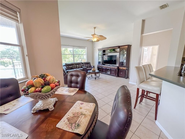 2041 24th Ave NE, Naples, FL 34120 - dining area featuring light tile patterned floors and a ceiling fan