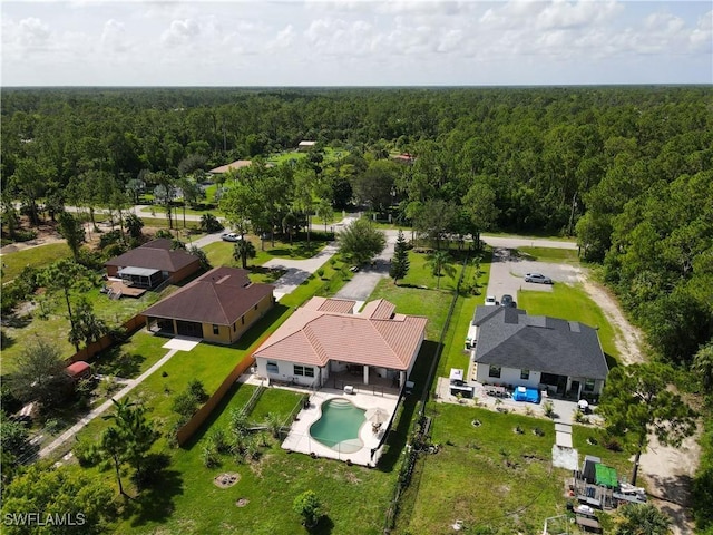2041 24th Ave NE, Naples, FL 34120 - aerial view of a forest and a pool