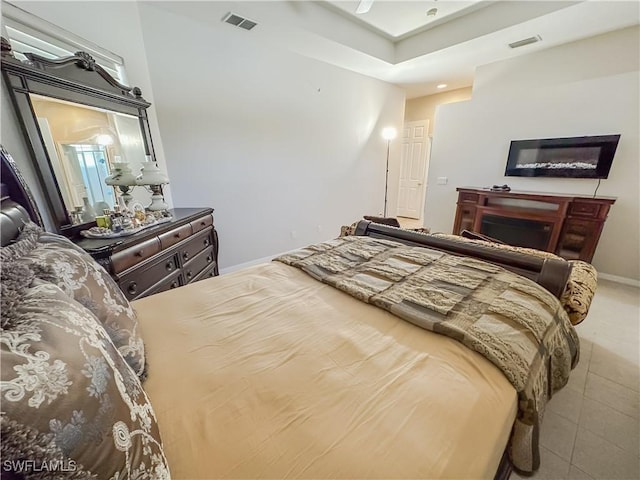 2041 24th Ave NE, Naples, FL 34120 - tiled bedroom featuring baseboards