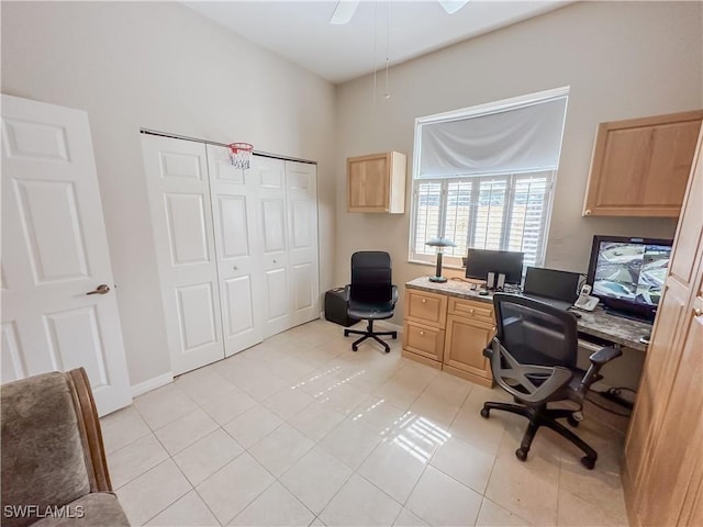2041 24th Ave NE, Naples, FL 34120 - home office with ceiling fan and light tile patterned flooring