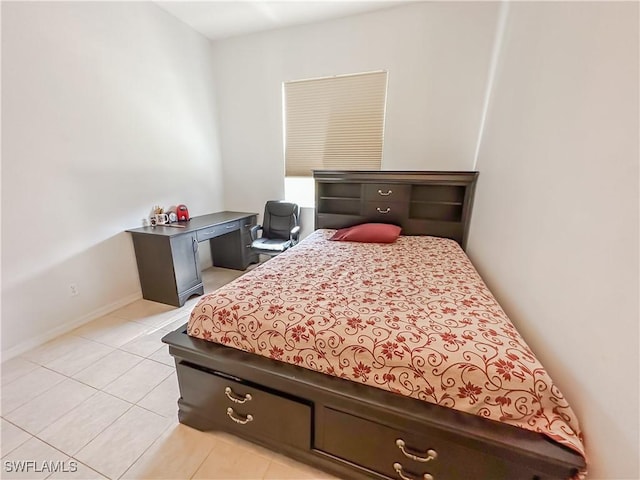 2041 24th Ave NE, Naples, FL 34120 - bedroom featuring light tile patterned floors