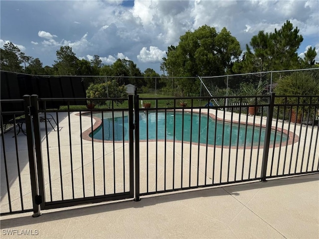 2041 24th Ave NE, Naples, FL 34120 - view of pool with a patio area