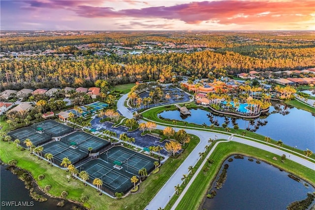 8331 Adelio Ln, Fort Myers, FL 33912 - aerial overview of property's location with a large body of water and nearby suburban area