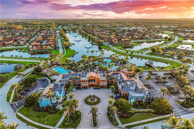 8331 Adelio Ln, Fort Myers, FL 33912 - aerial view at dusk of a water view and a residential view
