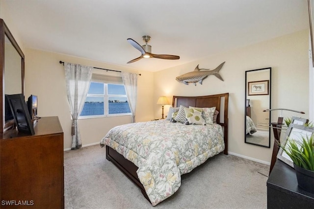 1900 Clifford St Unit 301, Fort Myers, FL 33901 - carpeted bedroom featuring baseboards and ceiling fan