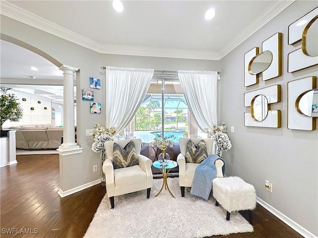 3032 Via Rialto St, Fort Myers, FL 33905 - sitting room featuring ornate columns, wood finished floors, arched walkways, ornamental molding, and recessed lighting