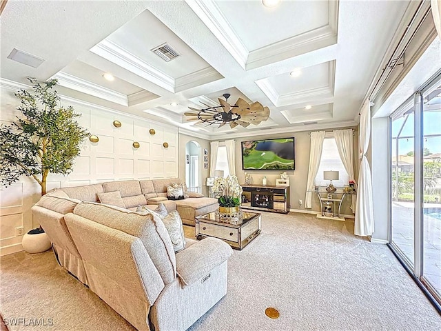 3032 Via Rialto St, Fort Myers, FL 33905 - living room with carpet floors, crown molding, coffered ceiling, beam ceiling, and arched walkways