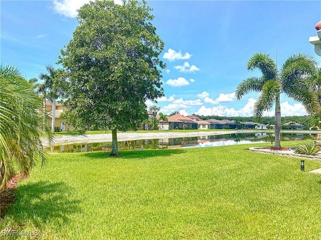3032 Via Rialto St, Fort Myers, FL 33905 - view of green lawn with a water view