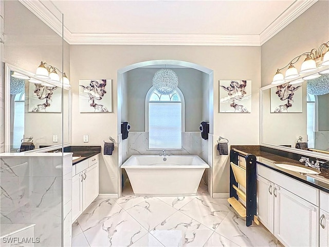 3032 Via Rialto St, Fort Myers, FL 33905 - bathroom featuring a freestanding bath, two vanities, ornamental molding, and marble finish flooring