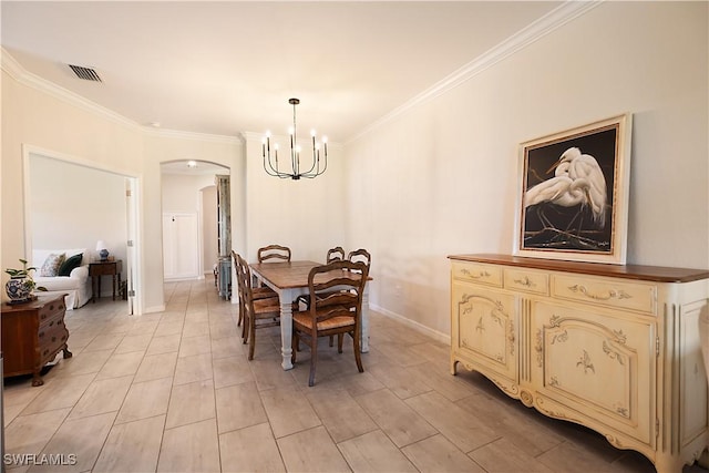 2042 Tamarron Ln, Naples, FL 34120 - dining area featuring arched walkways, a chandelier, and crown molding