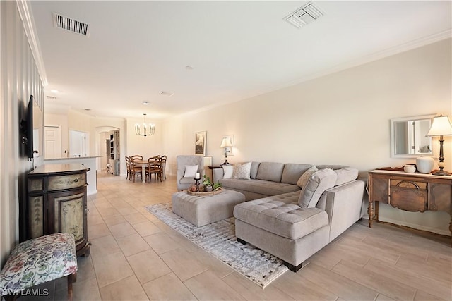 2042 Tamarron Ln, Naples, FL 34120 - living area featuring ornamental molding and a chandelier