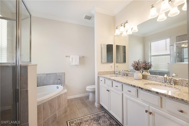 2042 Tamarron Ln, Naples, FL 34120 - bathroom featuring double vanity, a shower stall, crown molding, and a garden tub