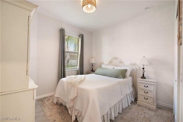 2042 Tamarron Ln, Naples, FL 34120 - bedroom with baseboards