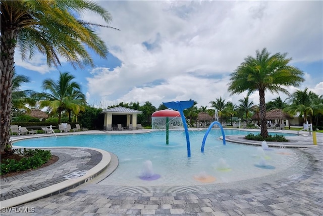 2042 Tamarron Ln, Naples, FL 34120 - community pool featuring a gazebo and a water play area